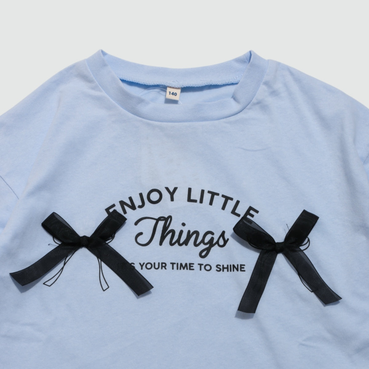 クロップド丈 リボンモチーフ 長袖Ｔシャツ